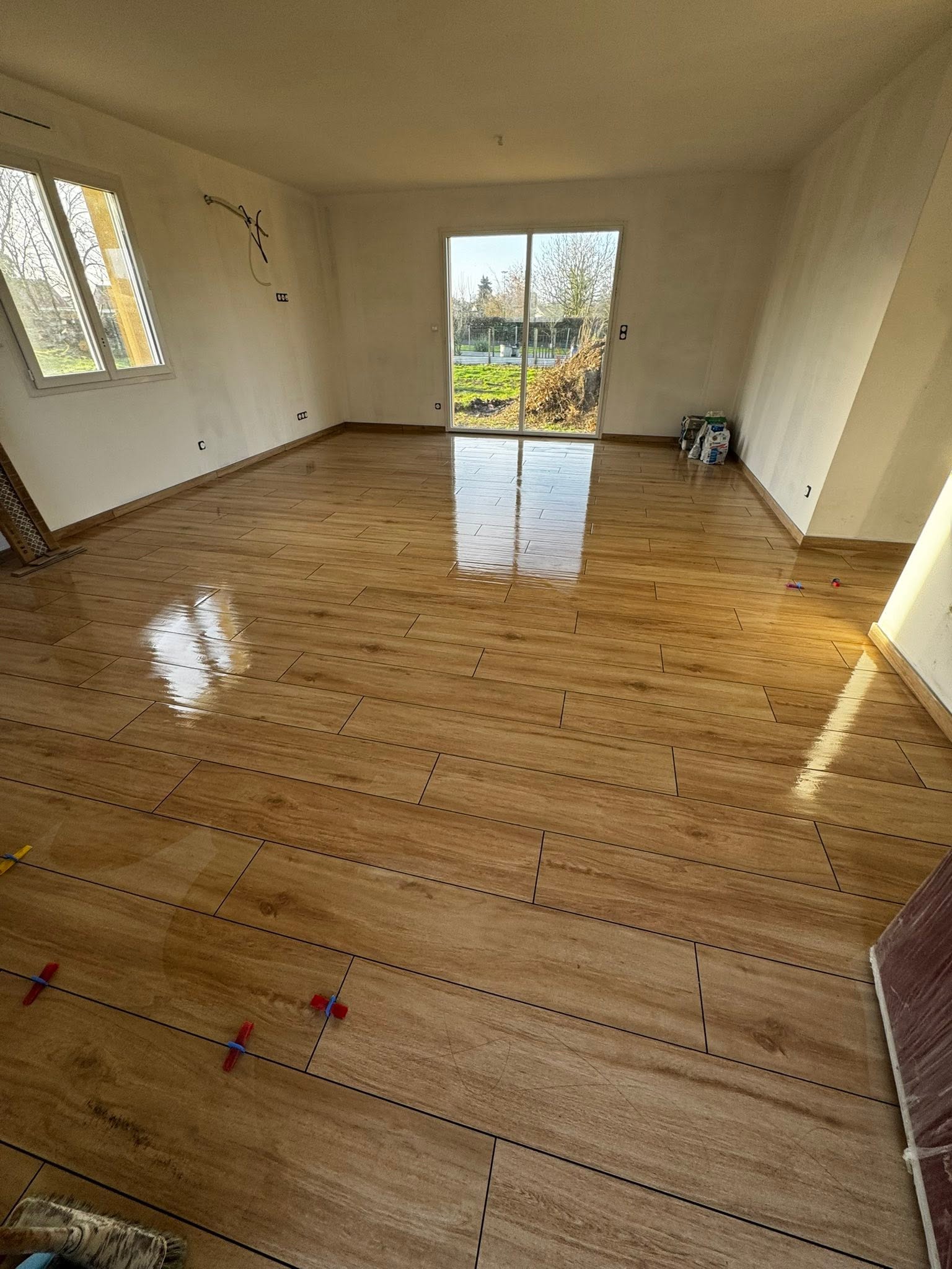 Pose de carrelage imitation parquet